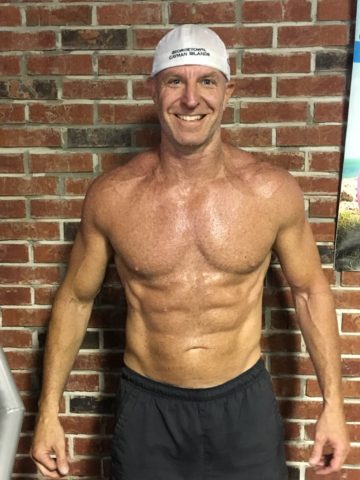 Client Ryan Dick six pack abs smiling frontal after picture