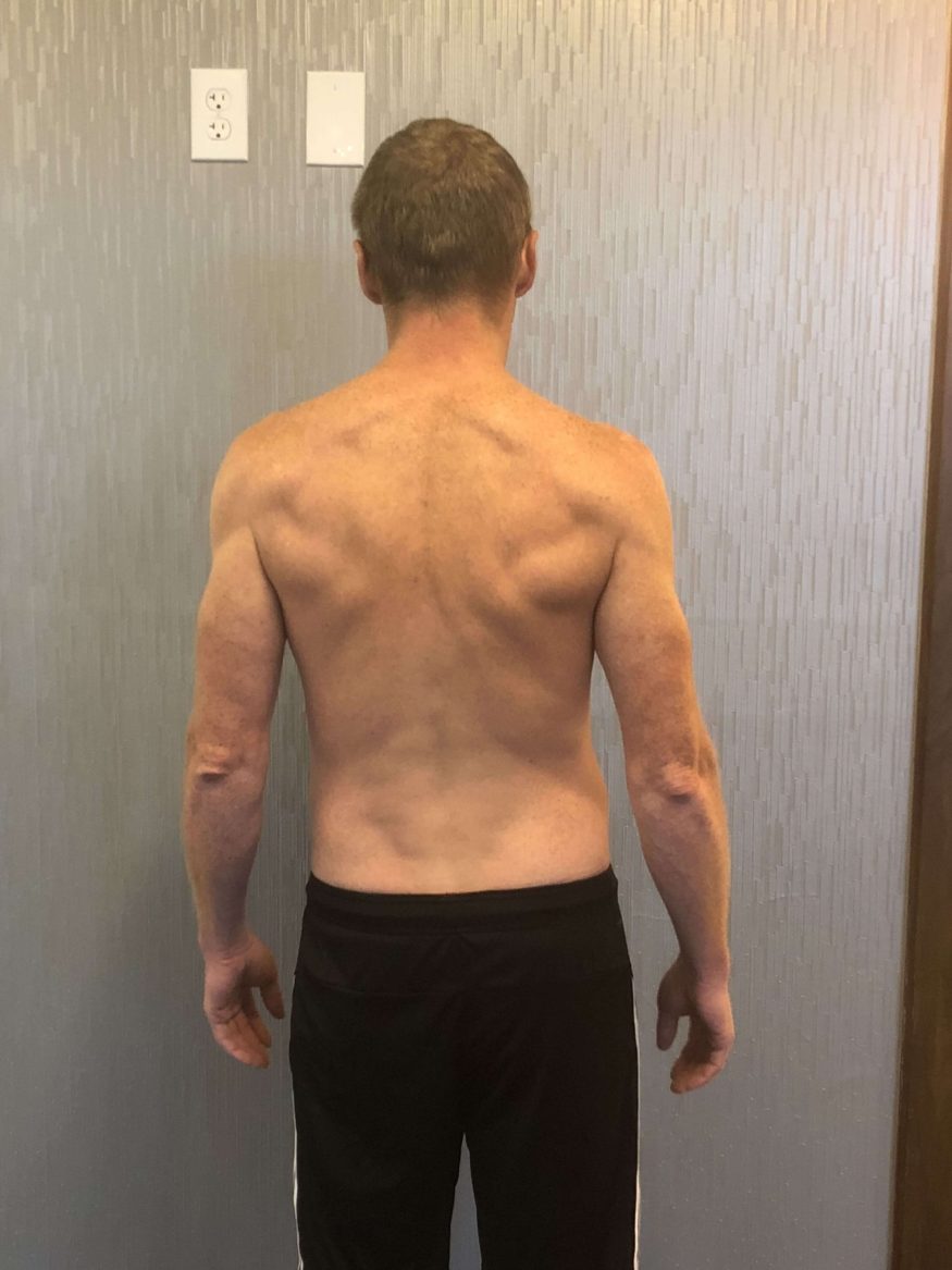 Client Bryan Reeves after picture weight loss results with shredded back muscles